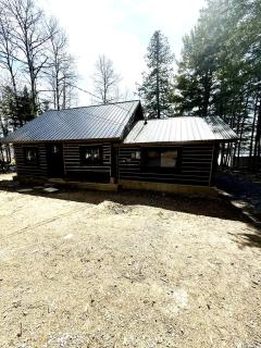 Charming Lakeside Cabin Bungalow with Timeless Rustic Beauty near Portage Lake in Maine - 0