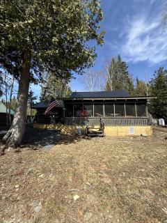 Charming Lakeside Cabin Bungalow with Timeless Rustic Beauty near Portage Lake in Maine - 3