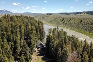 Charming Riverside Cabin with Deck Overlooking Madison River near Three Dollar Bridge in McAllister, Montana - 1