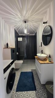 Anthracite Apartment on Felicjanek Street by CityBeat - 9