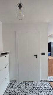 Anthracite Apartment on Felicjanek Street by CityBeat - 2