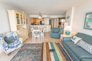 Spacious condo w beach & pool access - 1