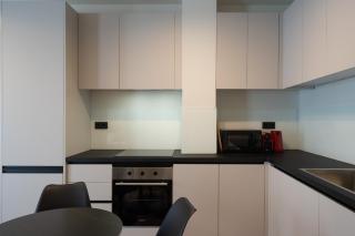 2BR Apartment, Access to Rooftop Retreat with Sauna & Jacuzzi - 9