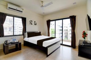 Collection O Axis Mall Road Formerly Moubani Residency - 9