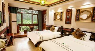 Huaqianshu Theme Inn - 2