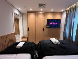 Flat Hotel Slaviero GRU 2 Quartos até 6p | Delfhy - 6