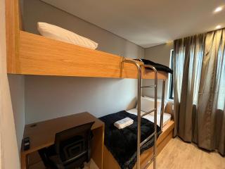 Flat Hotel Slaviero GRU 2 Quartos até 6p | Delfhy - 1