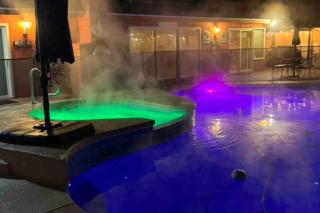 Family Friendly Close of Strip Hot Tub and Driveway - 0