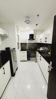 ZayrNest 2BR Apt Pool Gym Cinema, Snooker Luxe - 1