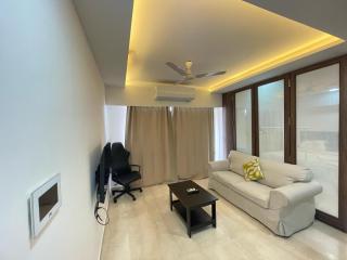 Business-Ready Apt near Jio World Centre 1BR Gym Pool WiFi - 1
