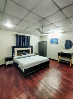 Modern 2BR Apartment with AC, Terrace & Kitchen, Clifton Karachi - 9