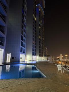 Corniche Residence Beach view Pool access Stunning View - Ajman - 3