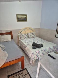 Casa arara suite 2 ou 3 com piscina para relaxar estacionamento gratuito e café da manhã self-service para começar bem o dia Comodidade e ótima localização - 1