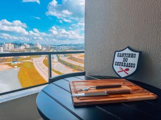 Apto com 1 quarto e sacada com churrasqueira - 1
