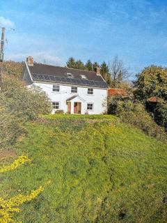 Beautiful farmhouse on a hill - 0