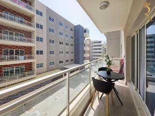 Al Reef Grace 1BR - Stylish Stay with Balcony, Dining & Kitchen Near Al Reef Beac - Abu Dhabi - 1