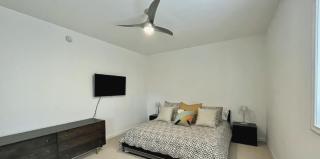 Expansive Five-Bedroom Home with Rooftop Entertain - 9