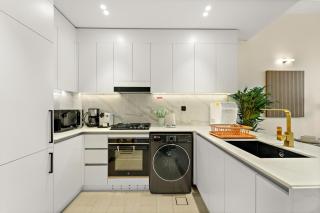 Bright & Cozy 1BR Apartment with Balcony in JVC - 7