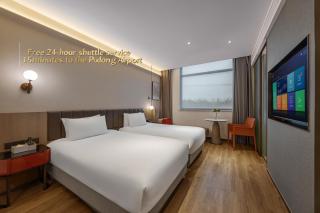 上海浦东机场华美达安可酒店-免费提供24小时浦东机场班车十分钟到达候机楼出发层 - Shanghái - 9