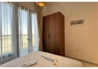 Dove 2BR Modern Poolside Stay - Walk to Masdar Park & City Centre Mall - Abu Dhabi - 7