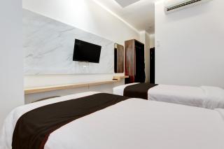 Townhouse OAK Near The Park Mall Semarang Formerly Semarang Boutique Hotel - 4
