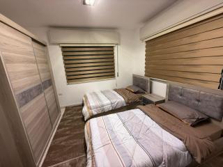 2BR Apartment in Tlaa Al Ali, Parking, AC, WIFI - 1