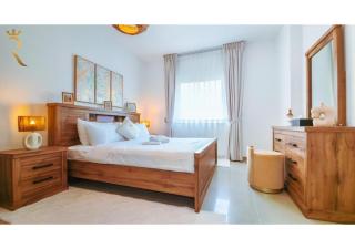 Roxen Haven 1BR - Cozy Poolside Comfort Near Al Reef Beach - Abu Dhabi - 9