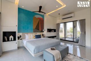 StayVista at The Amaryllis with Heated Pool & Projector Set-Up - 1
