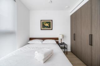 Urban Retreat 2BR Condo with Stunning City View - 1