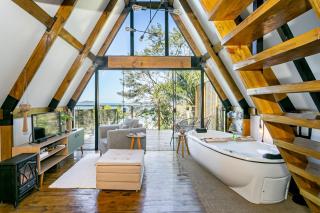 Vista Mar e Banheira de hidromassagem - Chalé Shánti - Florianópolis - SC - Brasil - 9