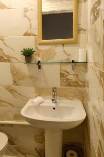 Airport and City Access Stylish 3BR with Garden Plus Parking - 1