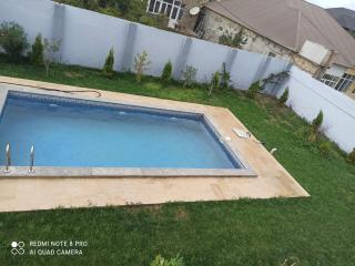 A two-storey cozy house with a pool - 1