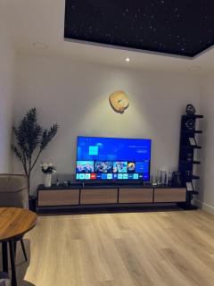 A hotel apartment consisting of a bedroom and a living room - 6