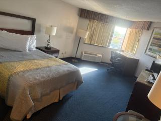 Apm Inn & Suites - 1