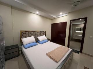 King Size Bedroom CUBE Apartments Bahria Enclave - 7
