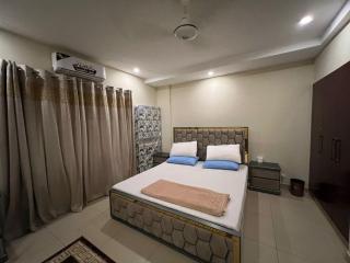 King Size Bedroom CUBE Apartments Bahria Enclave - 3