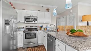 Cozy 3-Bedroom Condo - Comfy Living Space Two Balconies Outdoor Pool Beach Walkable - Score up to 450 Every Day in Tickets for Local Activities - 4