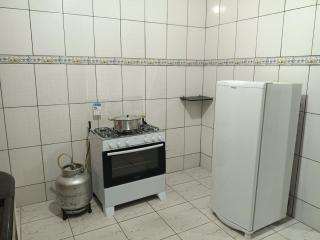 Casa grande, ar em todos os quartos, cabe 3 carros - 1