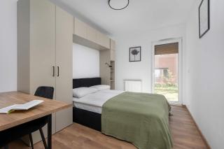 Elegant White Apartment with Terrace & Parking in Wrocław by Noclegi Renters - 9