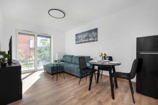 Elegant White Apartment with Terrace & Parking in Wrocław by Noclegi Renters - 7