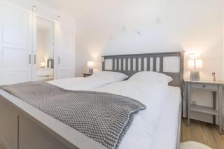 Penthouse-Wohnung mit großer Sonnenterrasse, eigener Sauna & kostenlosem Strandkorb am Hooksieler Sandstrand in modernem Neubau von 2022 - 1