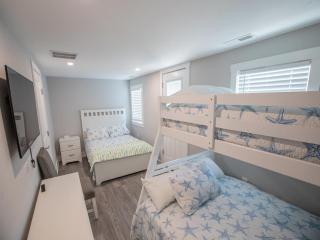 Beach House with Rooftop Deck by Leavetown Vacations - 9