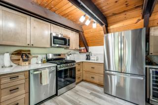Sleek Blue Lake Springs Retreat with Deck and Yard! - 1