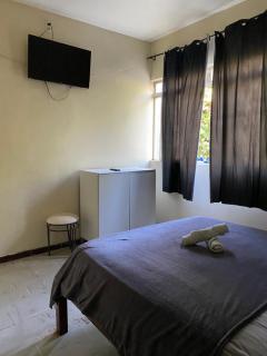 Quarto econômico central - 8