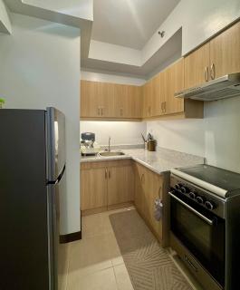 Cozy 2Br Condo Unit with Balcony Views - 1