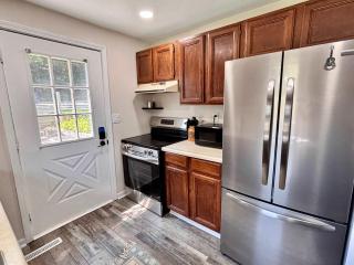 Cozy Main Level Torch Lake Stay with Private Entry & Fire Pit - 6