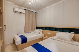 Travelholic Residence Near Mivida - 9