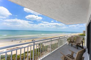 Updated direct oceanfront corner with a wrap-around balcony, heated pool and beach access - 9