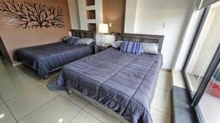 S08 DOBLE CAMA MATRIMONIAL Premium Suite Frente al TEC CEM con Cocineta WiFi Balcón Parking Terraza - 4
