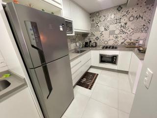 Cód 27 - Apartamento térreo com jacuzzi e área gourmet na Praia de Palmas - 1